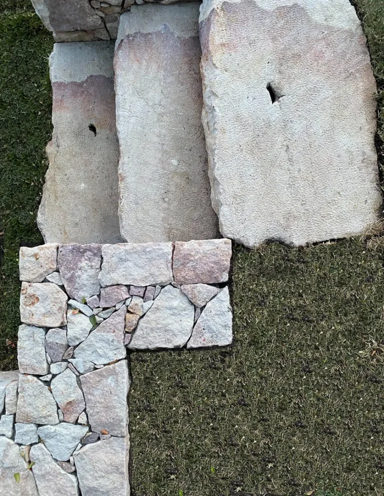 Stone stairs with adjacent grass surface