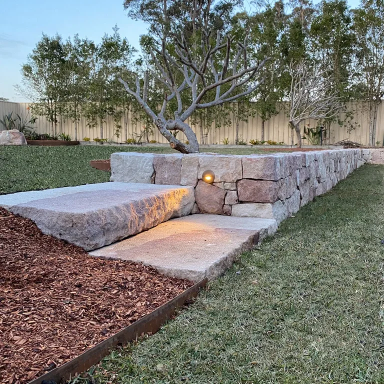 Stone wall with LED lights in a garden