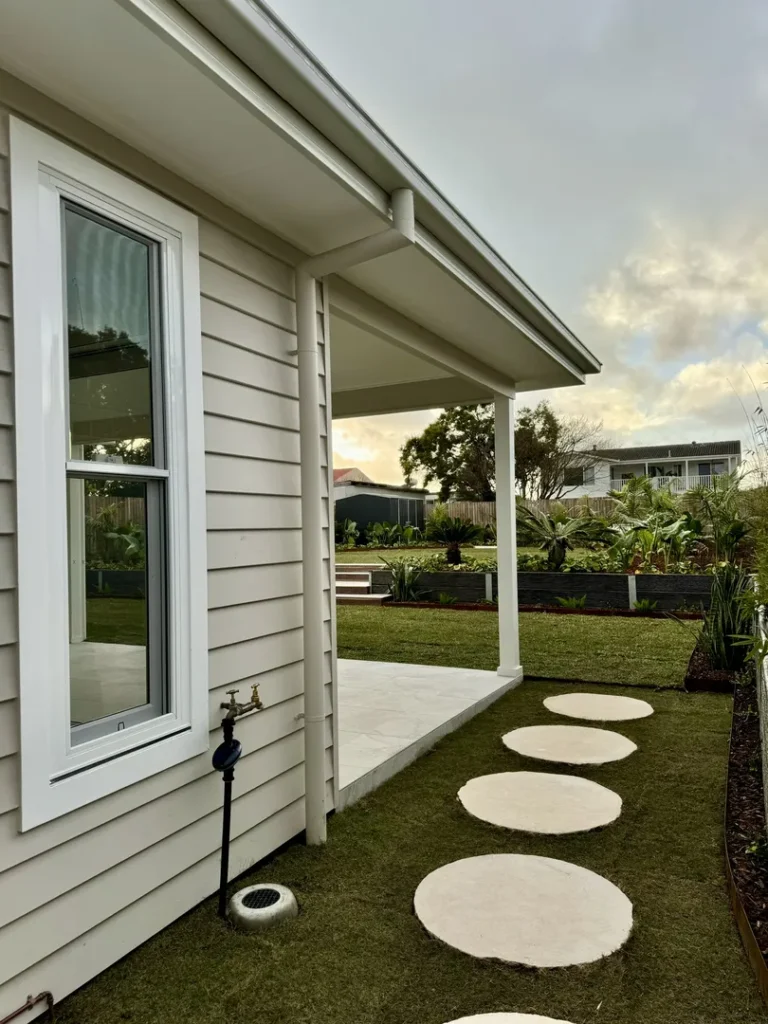 Modern house with garden and stone path