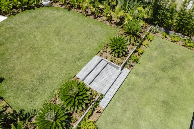 Aerial view of landscaped garden with wooden steps