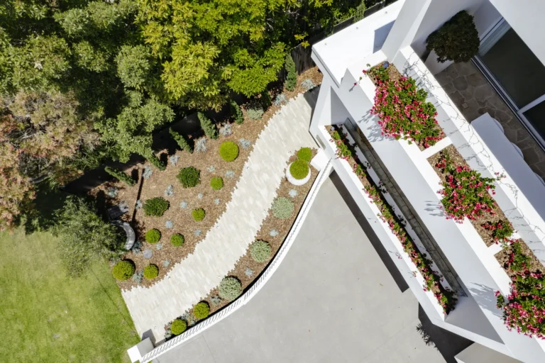 Aerial view of modern house with landscaped garden